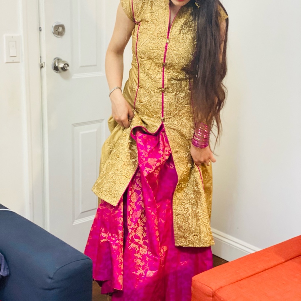 Pink long skirt with golden long kurta, and two colour scarf,
